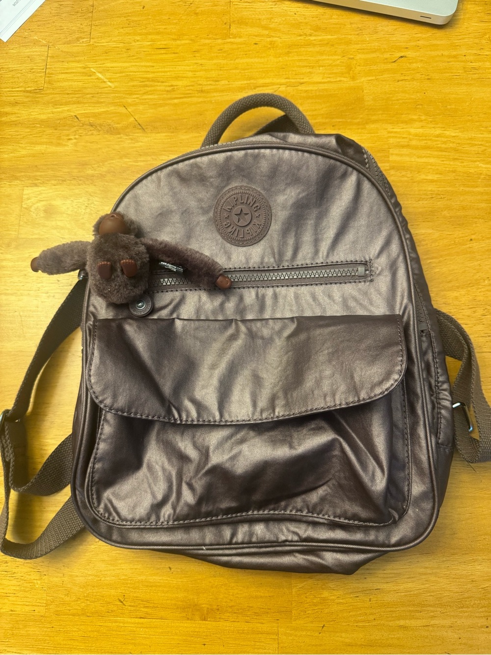 Kipling Metallic Brown Backpack with Monkey Charm